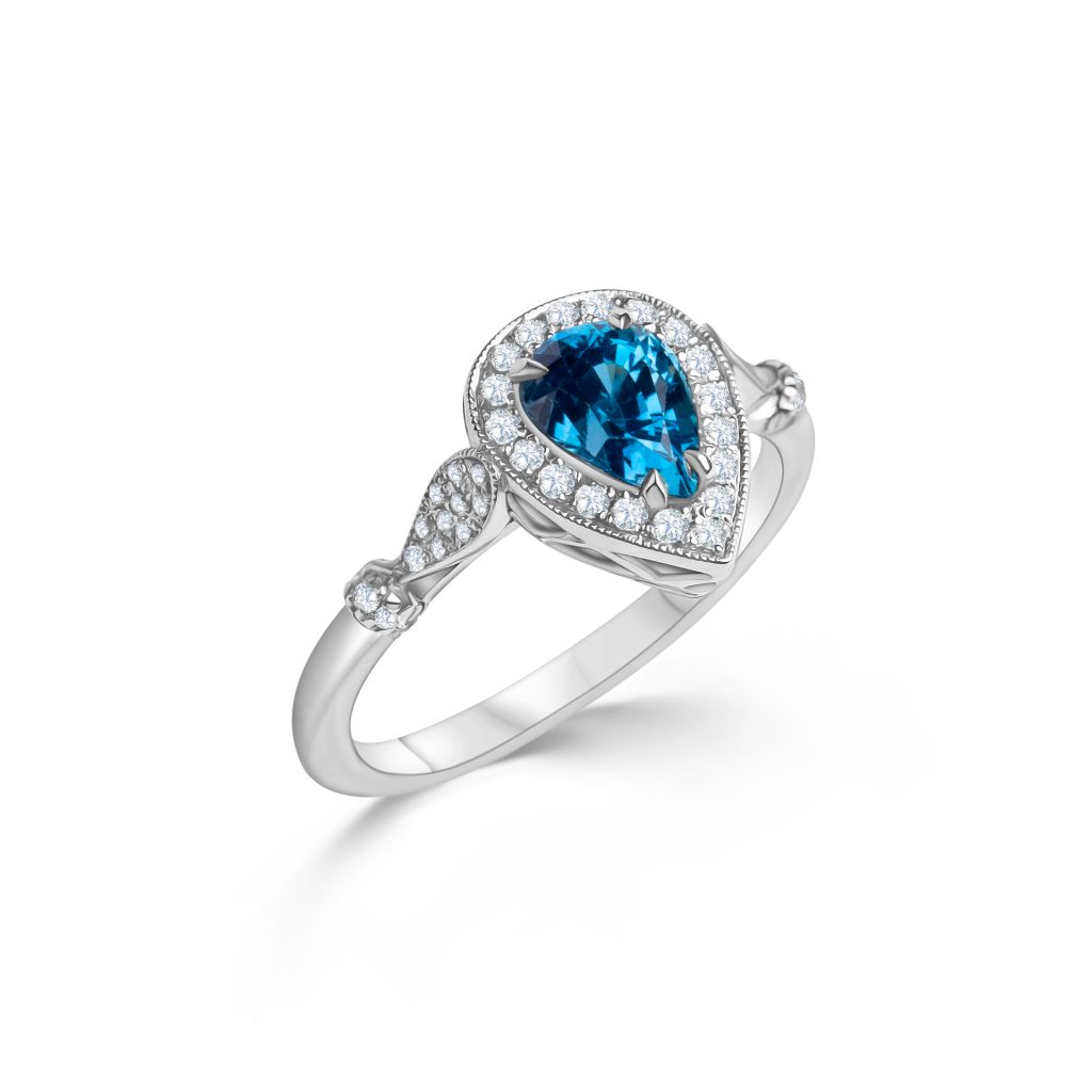 18 kt Weißgoldring mit tropfenförmigen Brillanten und Saphir