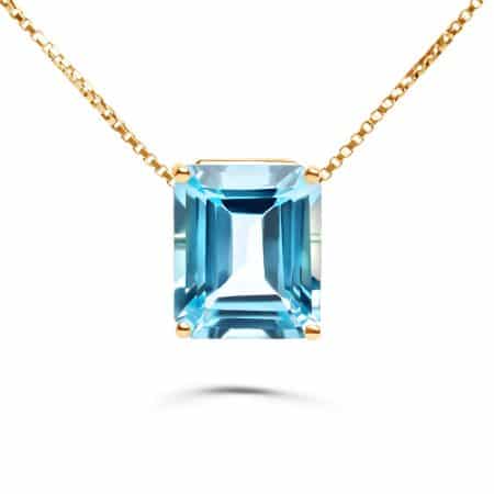 Anhänger blauer Topas und 18kt Gelbgold – “Flying Topas”